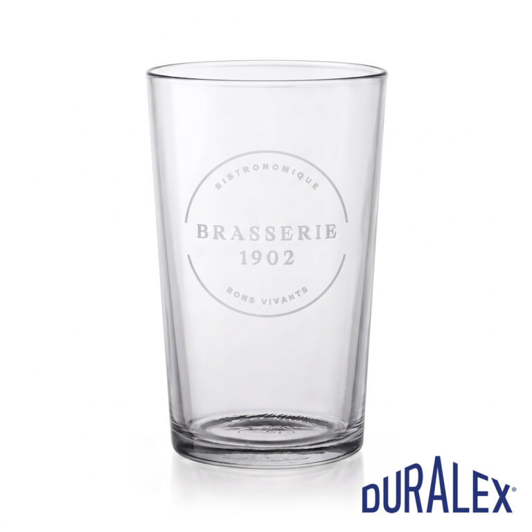 Verre à bière Duralex Unie 56 cl personnalisé Verre à bière Duralex Unie 56 cl transparent avec le logo circulaire Brasserie 1902 sur la face avant.